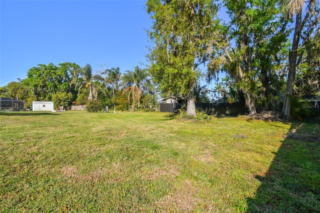 view of yard featuring fence