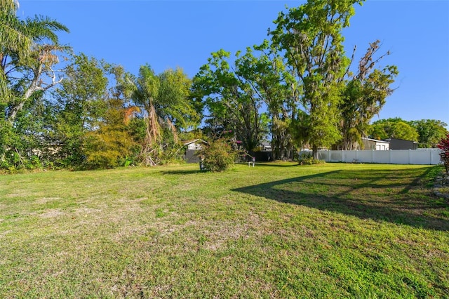 view of yard featuring fence