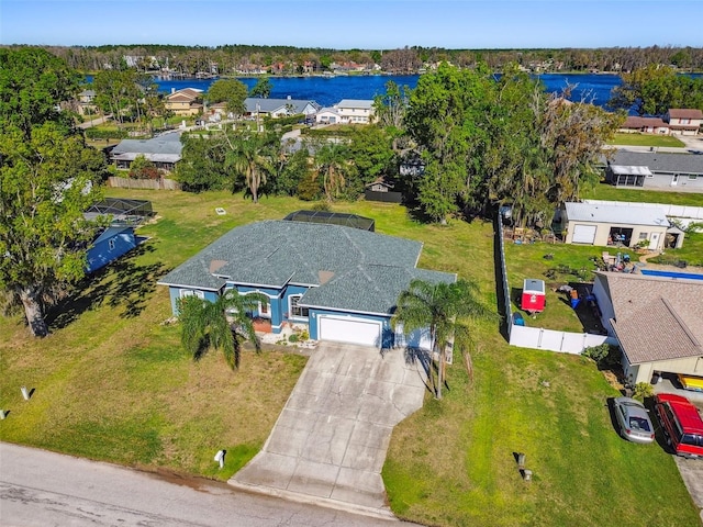 aerial view with a residential view and a water view