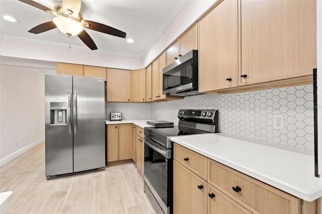 kitchen featuring decorative backsplash, appliances with stainless steel finishes, light brown cabinets, and crown molding