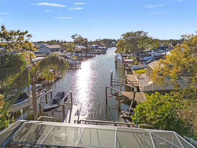 dock area featuring a water view and boat lift