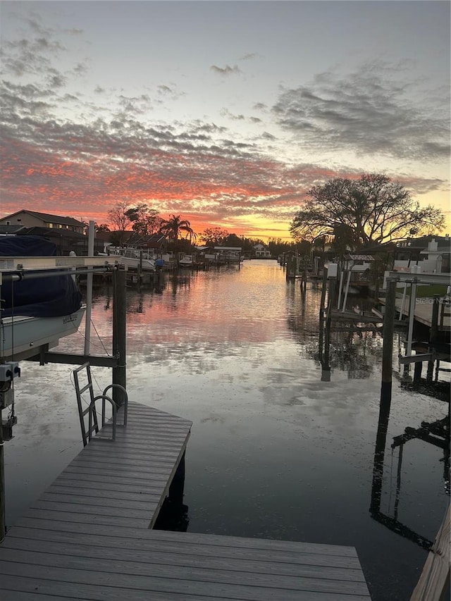 view of dock featuring a water view and boat lift