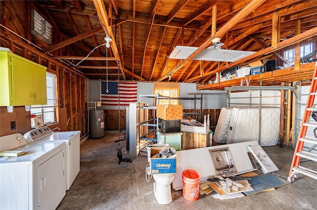 interior space with washer and dryer and electric water heater