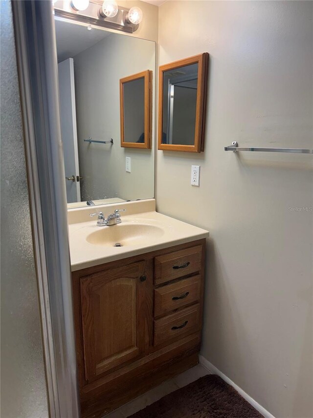 3046 Eastland Blvd Unit J106, Clearwater, FL 33761 - bathroom featuring vanity