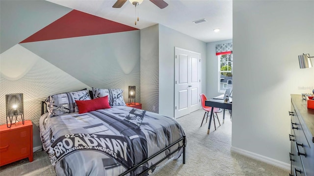 bedroom featuring a ceiling fan, carpet, visible vents, baseboards, and vaulted ceiling