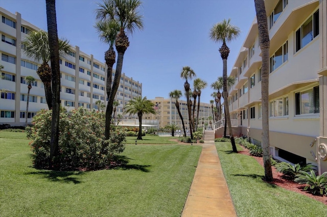 view of home's community featuring a yard