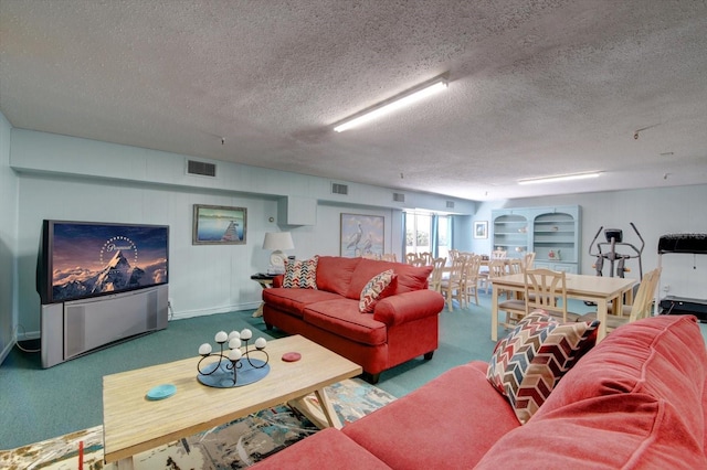 carpeted living room with visible vents and a textured ceiling