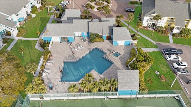 birds eye view of property with a residential view