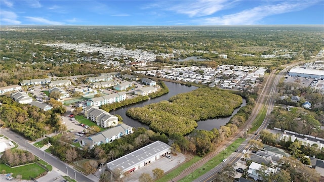 bird's eye view with a residential view and a water view