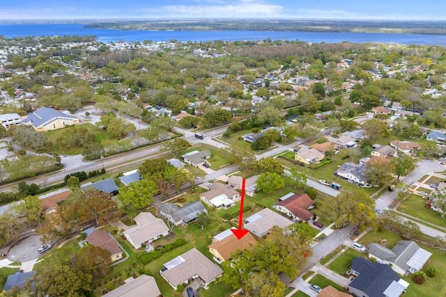 bird's eye view with a residential view and a water view