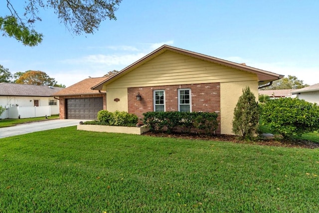 ranch-style house featuring brick siding, an attached garage, fence, a front yard, and driveway