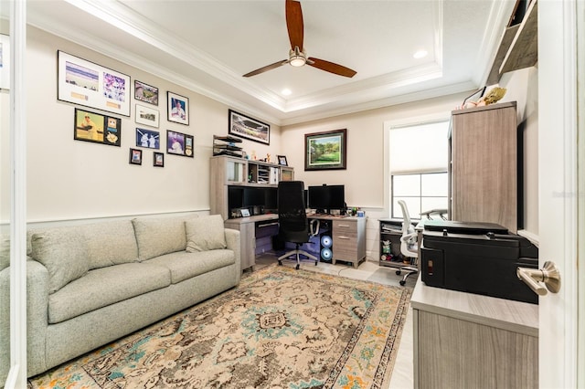 office space featuring recessed lighting, a raised ceiling, a ceiling fan, and ornamental molding