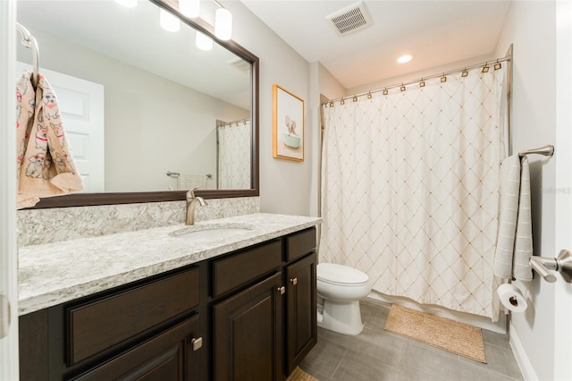 full bathroom featuring tile patterned floors, visible vents, toilet, and vanity