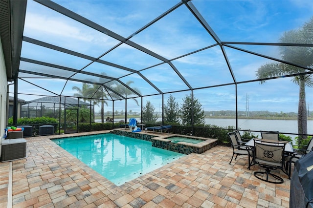 view of pool with a patio, central AC unit, a pool with connected hot tub, a water view, and a lanai