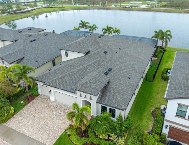 birds eye view of property featuring a water view