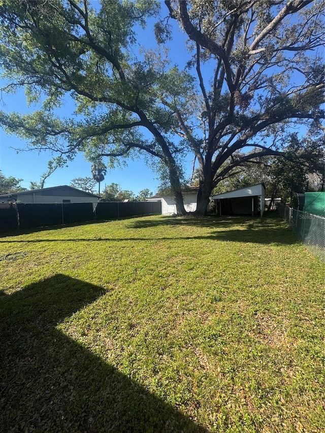 view of yard featuring a fenced backyard