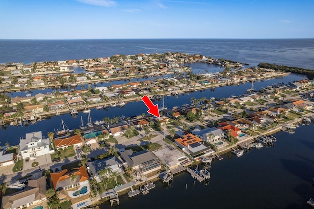 aerial view with a residential view and a water view