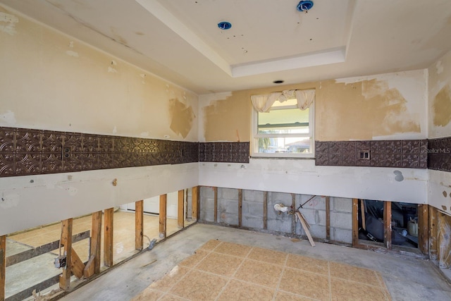 kitchen with a raised ceiling