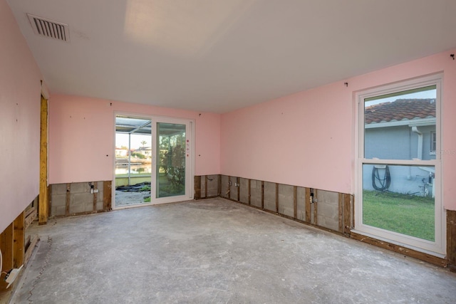 empty room featuring visible vents and concrete floors