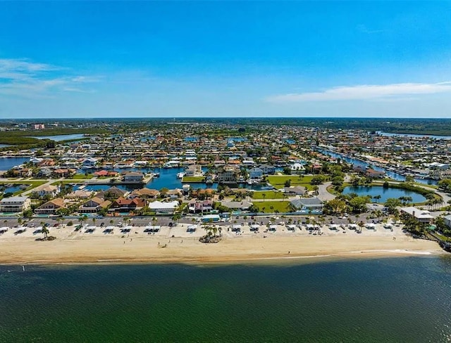 aerial view with a beach view and a water view