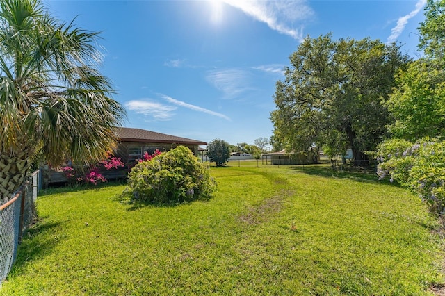 view of yard featuring fence