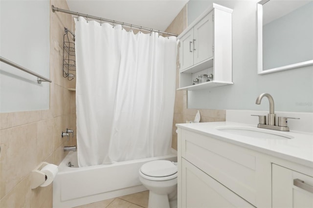 full bathroom with toilet, tile walls, shower / tub combo, tile patterned flooring, and vanity