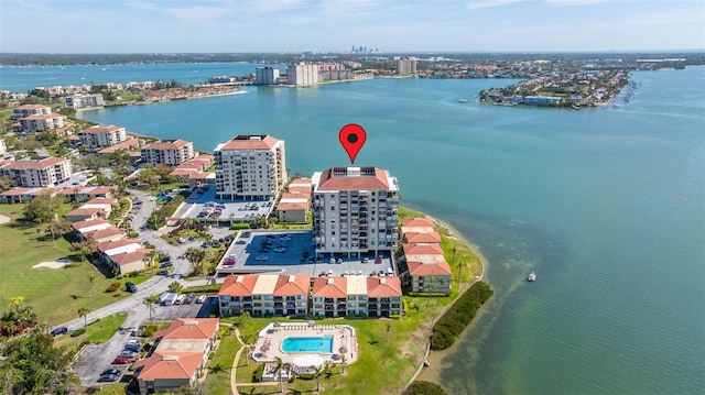 bird's eye view with a city view and a water view