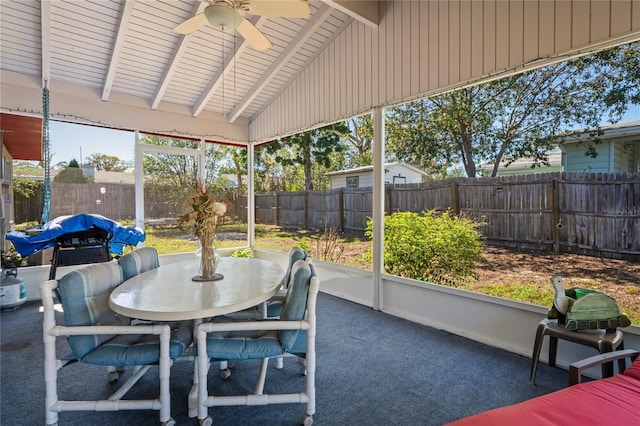 sunroom / solarium with vaulted ceiling with beams and ceiling fan