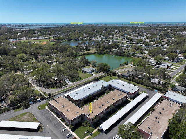 drone / aerial view with a water view