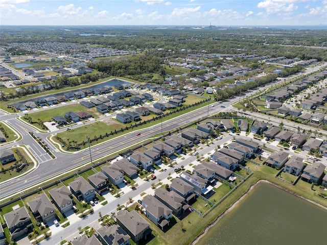 aerial view featuring a residential view and a water view