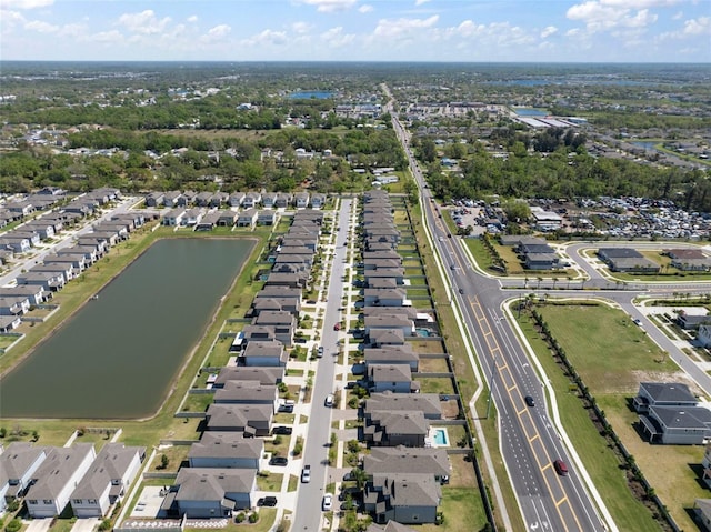 aerial view with a residential view and a water view