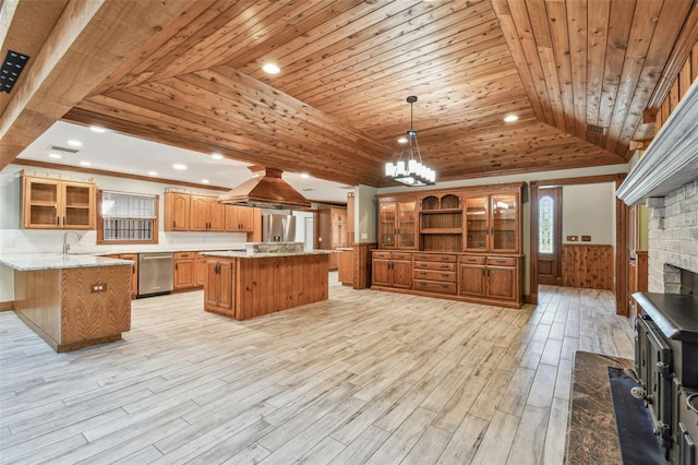 kitchen with ornamental molding, glass insert cabinets, appliances with stainless steel finishes, wooden ceiling, and island range hood