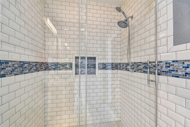 full bathroom with a shower stall