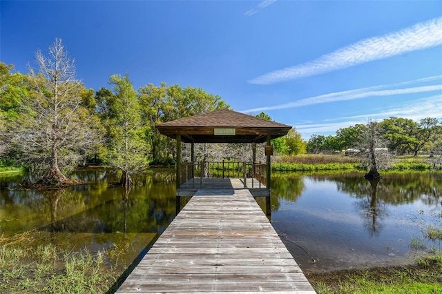 dock area featuring a gazebo and a water view