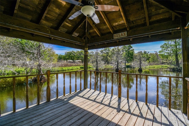 view of dock with a gazebo and a water view