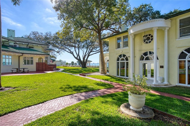 view of yard with french doors