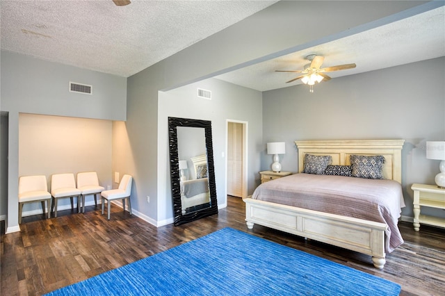 bedroom with visible vents and wood finished floors