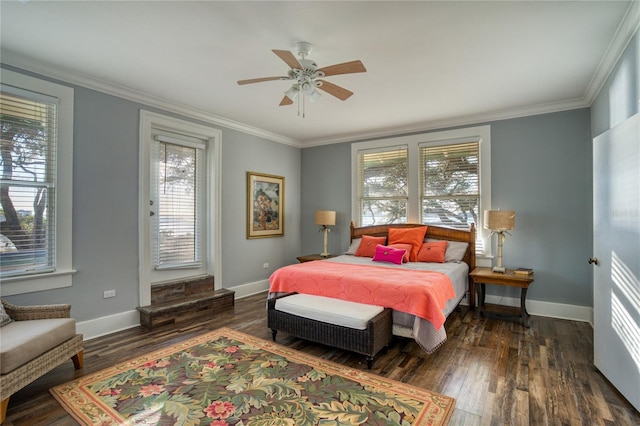 bedroom featuring wood finished floors, baseboards, and ornamental molding