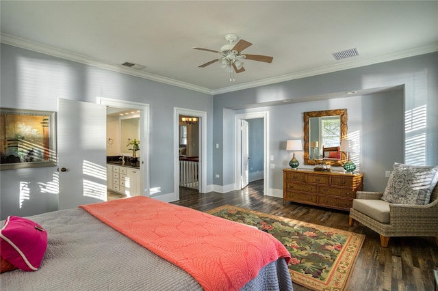 bedroom featuring wood finished floors, visible vents, baseboards, ceiling fan, and crown molding