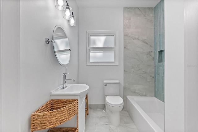bathroom with a shower, vanity, toilet, baseboards, and marble finish floor