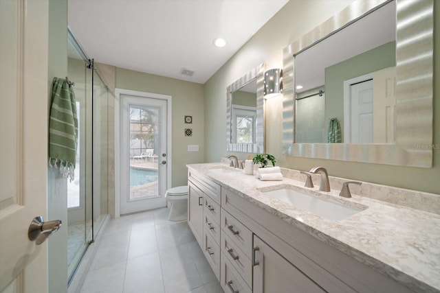 full bathroom featuring a sink, visible vents, and a stall shower