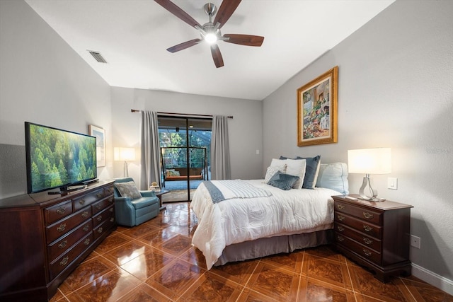 bedroom featuring visible vents, dark tile patterned floors, a ceiling fan, access to outside, and baseboards