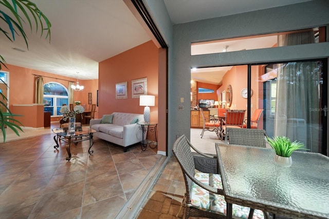 living area with an inviting chandelier