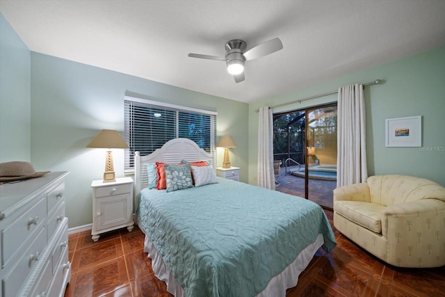 bedroom featuring baseboards, a ceiling fan, and access to outside