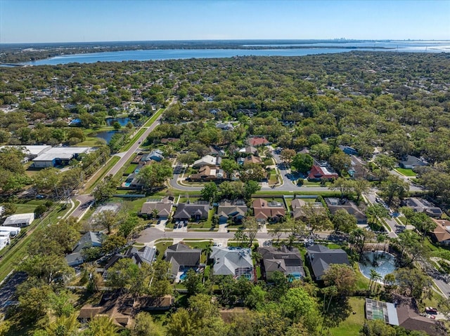 bird's eye view featuring a residential view and a water view