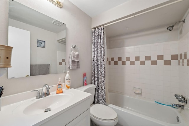 full bathroom featuring vanity, toilet, and shower / bath combo with shower curtain