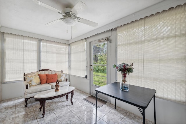 sunroom / solarium with ceiling fan