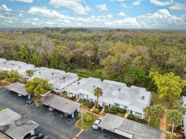 aerial view featuring a forest view