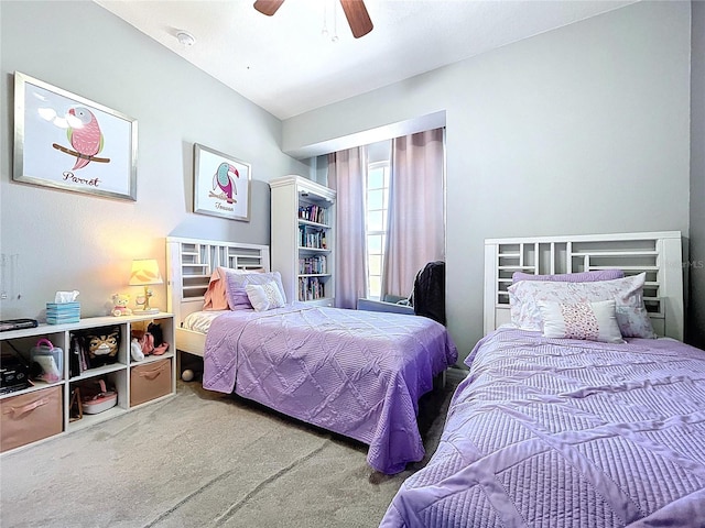 carpeted bedroom with a ceiling fan