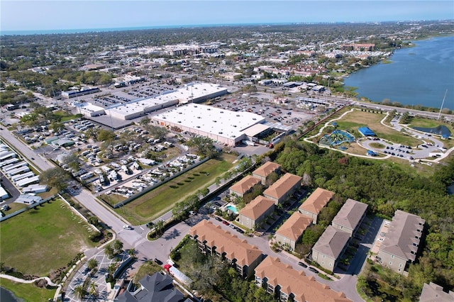 drone / aerial view with a water view